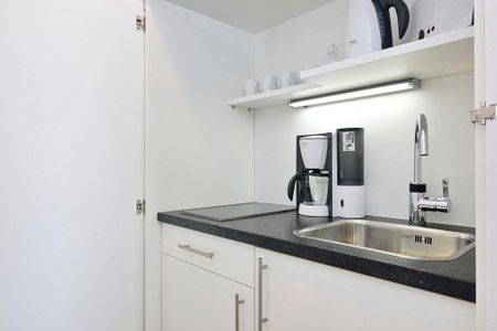 Aparthotel Anna Düne Aparthotel Anna Düne 1-22 Wangerooge - Wohn/ Essbereich mit Küchenzeile