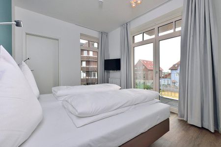 Aparthotel Anna Düne Aparthotel Anna Düne 1-25 Wangerooge - Schlafzimmer mit Doppelbett