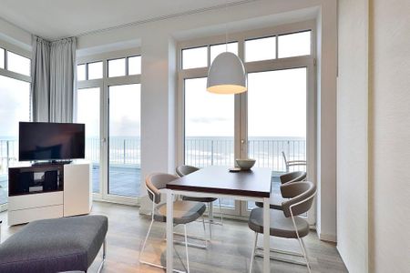 Aparthotel Anna Düne Aparthotel Anna Düne 2-33 Wangerooge - Wohn/ Essbereich mit Esstisch