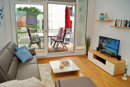 DünenResort Binz DünenResort Binz 418 Rügen - Wohn-Essbereich mit Couch