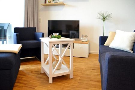 DünenResort Binz DünenResort Binz 419 Rügen - Wohn-Essbereich mit Couch