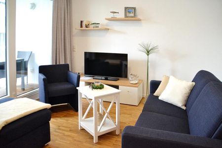 DünenResort Binz DünenResort Binz 419 Rügen - Wohn-Essbereich mit Couch