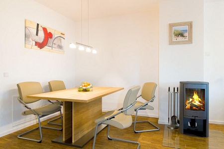 DünenResort Binz DünenResort Binz 116 Rügen - Wohn-Essbereich mit Esstisch und Sitzgelegenheit