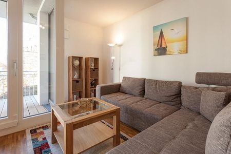 DünenResort Binz DünenResort Binz 417 Rügen - Wohn-Essbereich mit Couch