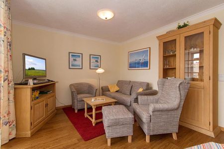 Apartmenthaus Atlantik Apartmenthaus Atlantik 216 Kühlungsborn - Wohn-Essbereich mit Couch