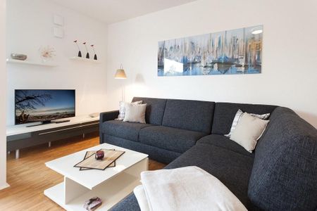 DünenResort Binz DünenResort Binz 113 Rügen - Wohn-Essbereich mit Couch