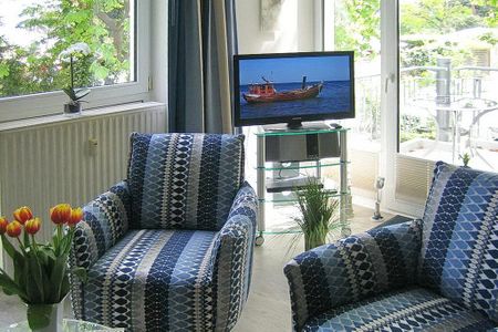 Strand-Park Strand-Park 322 Usedom - Wohn-Essbereich mit Couch und Flatscreen-TV
