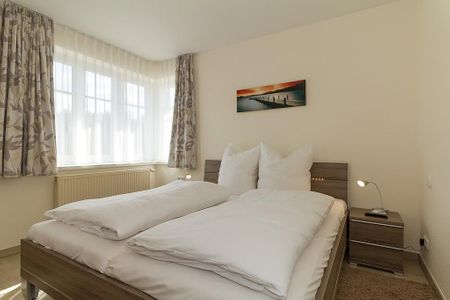 Strandschlösschen Strandschlösschen 17 Kühlungsborn - Schlafzimmer mit Doppelbett