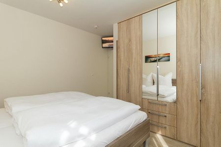 Strandschlösschen Strandschlösschen 17 Kühlungsborn - Schlafzimmer mit Doppelbett