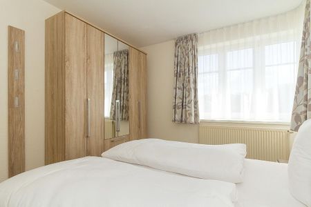 Strandschlösschen Strandschlösschen 17 Kühlungsborn - Schlafzimmer mit Doppelbett