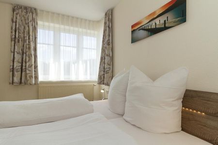 Strandschlösschen Strandschlösschen 17 Kühlungsborn - Schlafzimmer mit Doppelbett