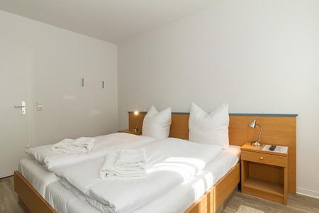 Strandschlösschen Strandschlösschen 09 Kühlungsborn - Schlafzimmer mit Doppelbett