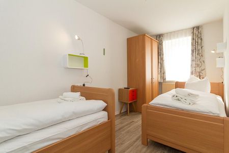 Strandschlösschen Strandschlösschen 09 Kühlungsborn - Schlafzimmer mit zwei Einzelbetten