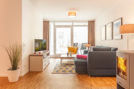 DünenResort Binz DünenResort Binz 413 Rügen - Wohn-Essbereich mit Couch