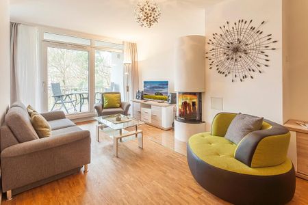 DünenResort Binz DünenResort Binz 125 Rügen - Wohn-Essbereich mit Couch