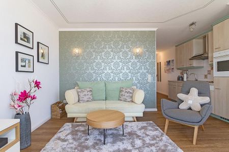 Meeresblick Meeresblick 420 Kühlungsborn - Wohn-Essbereich mit Couch