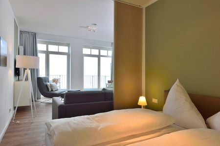 Aparthotel Anna Düne Aparthotel Anna Düne 1-23 Wangerooge - Schlafbereich mit Doppelbett