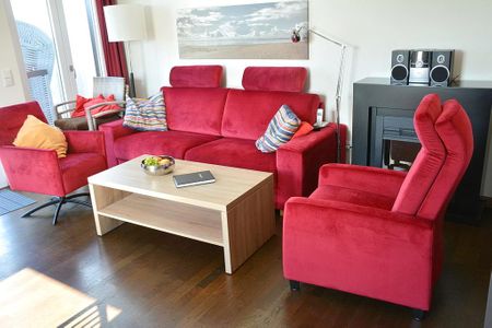 Resort Deichgraf Resort Deichgraf 27-20 Wremen - Wohn-Essbereich mit Couch