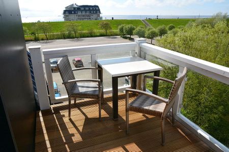 Resort Deichgraf Resort Deichgraf 27-20 Wremen - Balkon mit Gartenmöbeln