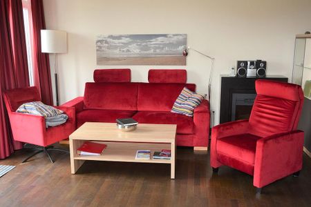 Resort Deichgraf Resort Deichgraf 27-20 Wremen - Wohn-Essbereich mit Couch