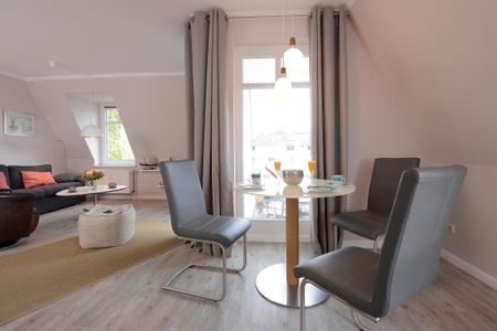 Ferienwohnanlage Seebachpark Seebachpark Boltenhagen - Wohn-Schlafbereich mit Zugang zum Balkon