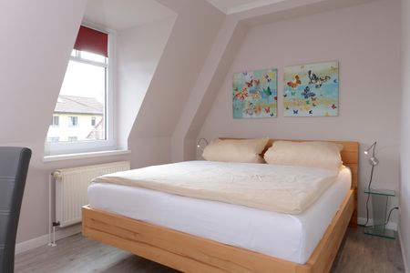 Ferienwohnanlage Seebachpark Seebachpark Boltenhagen - Wohn-Schlafbereich mit Doppelbett