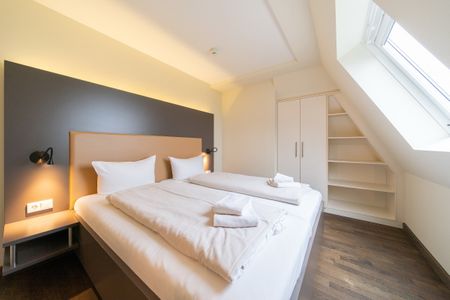 Resort Deichgraf Resort Deichgraf 31-20 Wremen - Schlafzimmer mit Doppelbett