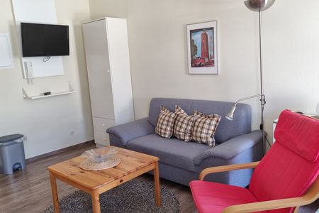 Haus Borkumitte Appartement Thor Haus Borkumitte - Wohnzimmer Sitzecke