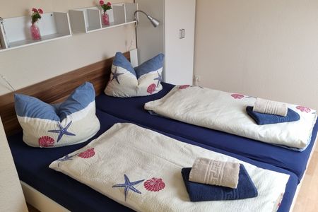 Geert-Bakker-Strasse Ferienwohnung Eddy Geert-Bakker-Straße - Schlafzimmer  mit Doppelbett