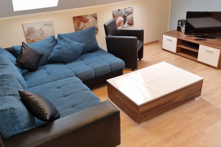 Geert-Bakker-Strasse Ferienwohnung Eddy Geert-Bakker-Straße - Wohnzimmer  Wohnlandschaft