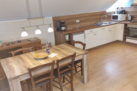 Geert-Bakker-Strasse Ferienwohnung Eddy Geert-Bakker-Straße - Wohnzimmer Essecke