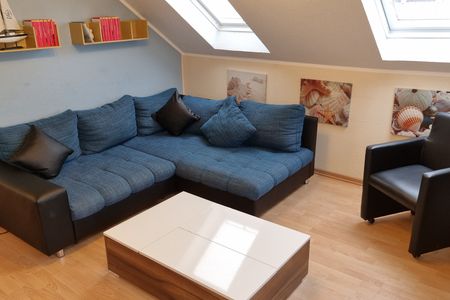 Geert-Bakker-Strasse Ferienwohnung Eddy Geert-Bakker-Straße - Wohnzimmer Sitzecke