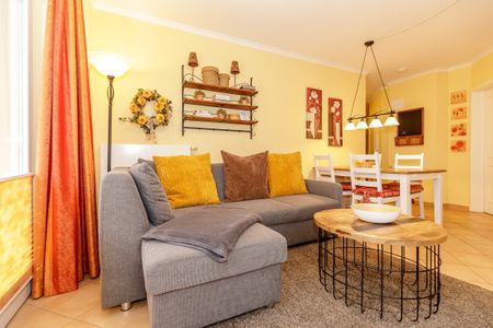 Dünenschloss Dünenschloss 2-01 Kühlungsborn - Wohn-Essbereich mit Couch