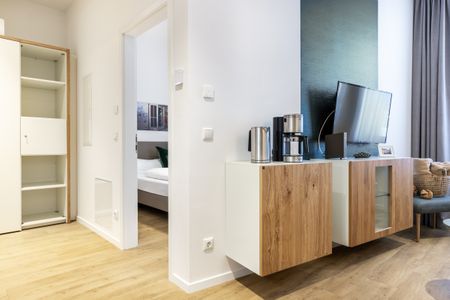 Ferienapartments am Krusespeicher Ferienapartments am Krusespeicher 1-05 Wismar - Wohn-/Essbereich mit Flatscreen-TV