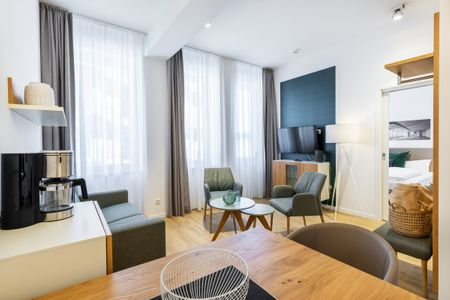 Ferienapartments am Krusespeicher Ferienapartments am Krusespeicher 1-08 Wismar - Wohn-/Essbereich mit Zugang zum Schlafzimmer