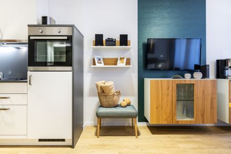 Ferienapartments am Krusespeicher Ferienapartments am Krusespeicher 1-11 Wismar - Wohn-/Schlafbereich mit Flatscreen-TV
