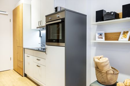 Ferienapartments am Krusespeicher Ferienapartments am Krusespeicher 1-11 Wismar - Wohn-/Schlafbereich mit Küchenzeile
