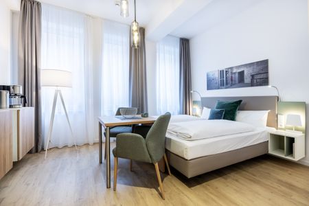 Ferienapartments am Krusespeicher Ferienapartments am Krusespeicher 2-22 Wismar - Wohn-/Schlafbereich mit Boxspringbett