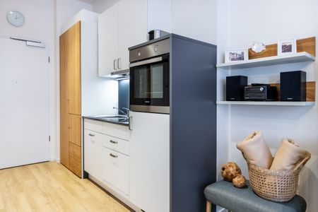 Ferienapartments am Krusespeicher Ferienapartments am Krusespeicher 2-22 Wismar - Wohn-/Schlafbereich mit Blick zum Eingang