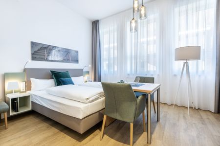 Ferienapartments am Krusespeicher Ferienapartments am Krusespeicher 3-29 Wismar - Wohn-/Schlafbereich mit Boxspringbett