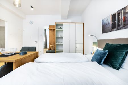Ferienapartments am Krusespeicher Ferienapartments am Krusespeicher 0-01 Wismar - Wohn-/Schlafbereich mit Kleiderschrank