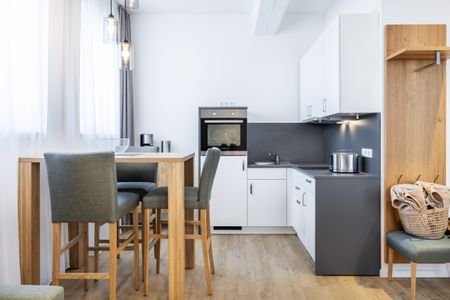 Ferienapartments am Krusespeicher Ferienapartments am Krusespeicher 1-09 Wismar - Wohn-/Essbereich mit Küchenzeile