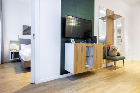Ferienapartments am Krusespeicher Ferienapartments am Krusespeicher 2-20 Wismar - Wohn-/Essbereich mit Zugang zum Schlafzimmer