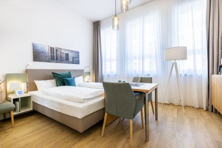 Ferienapartments am Krusespeicher Ferienapartments am Krusespeicher 3-27 Wismar - Wohn-/Schlafbereich mit Boxspringbett