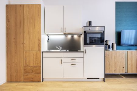 Ferienapartments am Krusespeicher Ferienapartments am Krusespeicher 3-31 Wismar - Wohn-/Schlafbereich mit Flatscreen-TV