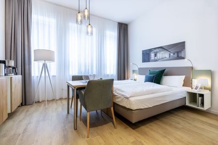 Ferienapartments am Krusespeicher Ferienapartments am Krusespeicher 3-32 Wismar - Wohn-/Schlafbereich mit Boxspringbett