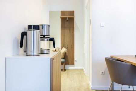 Ferienapartments am Krusespeicher Ferienapartments am Krusespeicher 3-35 Wismar - Wohn-/Essbereich mit Esstisch