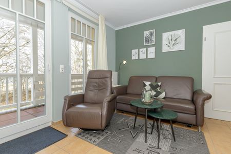 Dünenschloss Dünenschloss 2-20 Kühlungsborn - Wohn-Essbereich mit Couch