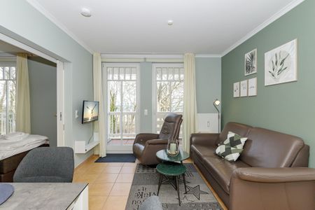 Dünenschloss Dünenschloss 2-20 Kühlungsborn - Wohn-Essbereich mit Couch