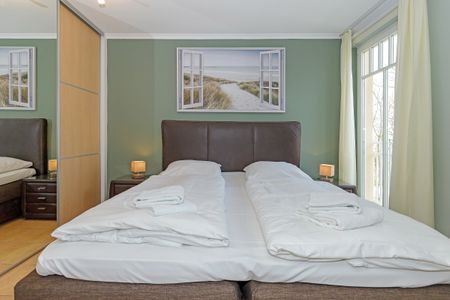 Dünenschloss Dünenschloss 2-20 Kühlungsborn - Schlafzimmer mit Doppelbett